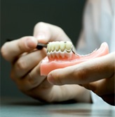 Dentures available at the one stop shop for new or replacement dentures where they do more dentures than anyone and have their own in-house denture lab