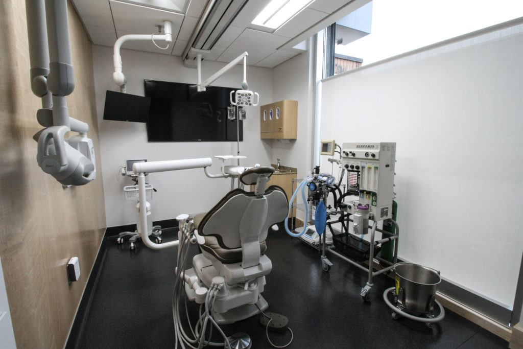 Treatment suite where patients receive cosmetic dentistry services at Anchorage Midtown Dental. 