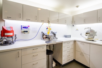 View of lab where Anchorage Midtown Dental can make dentures in a day. 